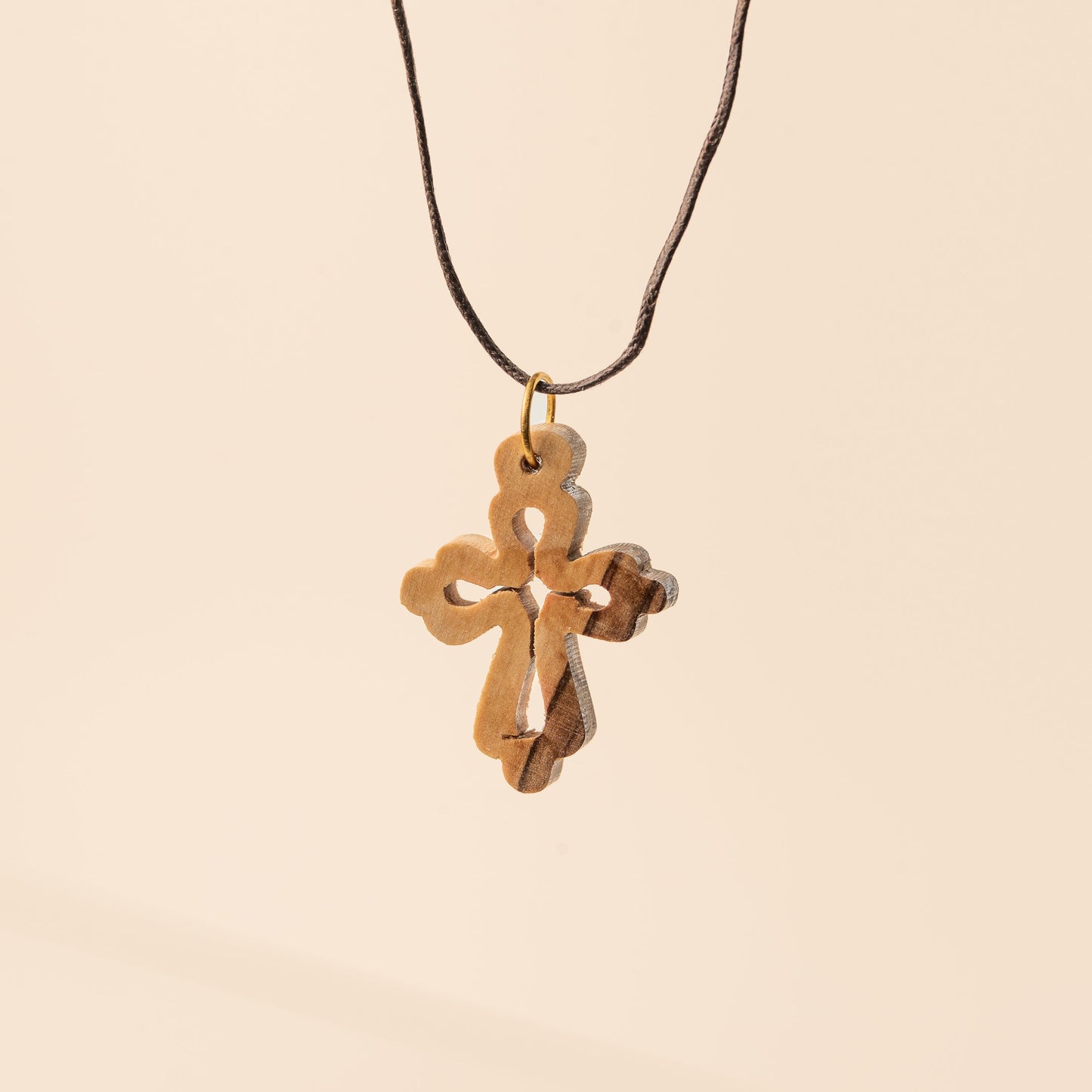Pendentif croix orientale sur cordon