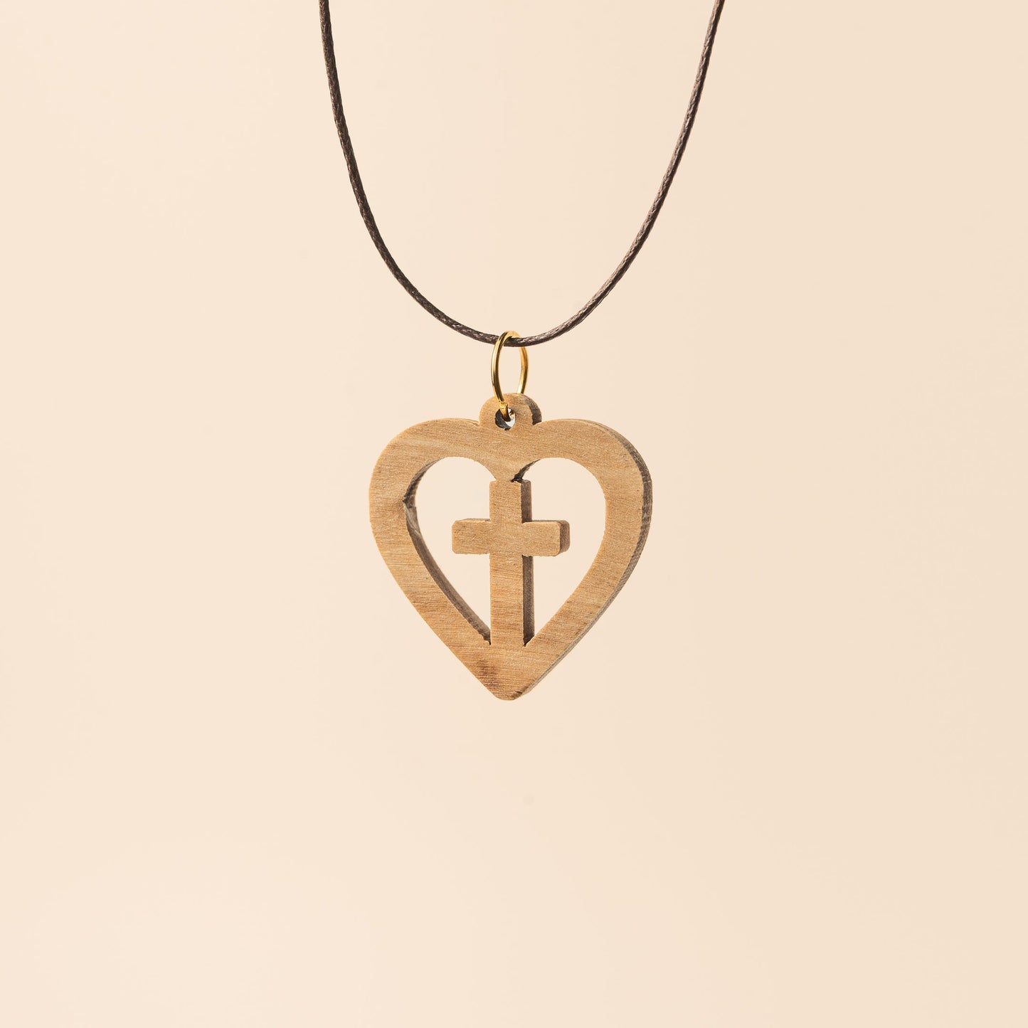 Heart pendant on cord